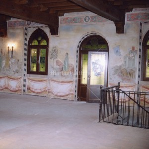 Medieval-style fresco painted on a wall at the Rocca di Montalfeo in Pavia